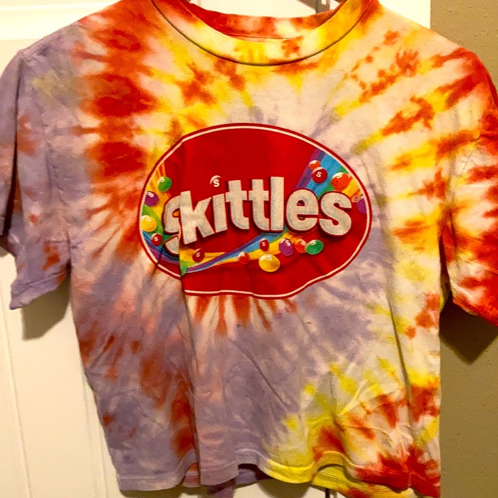A Mickey Mouse Disney shirt and a skittles tie-dye